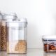 How should you store dry foods to prevent pest infestation